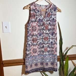 Elegant Sleeveless Tunic with Intricate Patterns